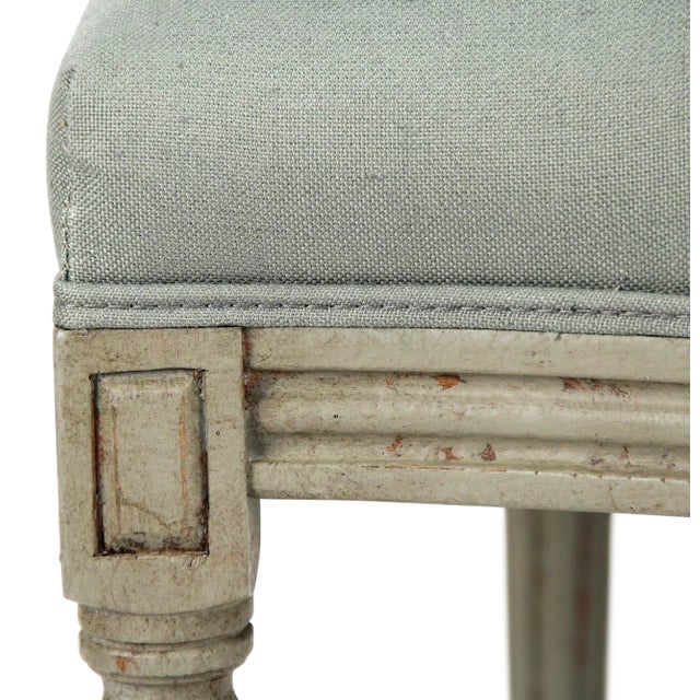 Round tufted back side chair upholstered in sage linen on faux olive birch frame.