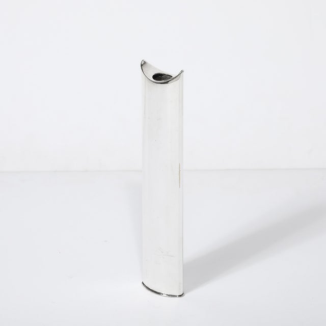 This Mid-Century Modern silver-plated "Giselle" bud vase is a graceful and sculptural piece of Italian design, created by...