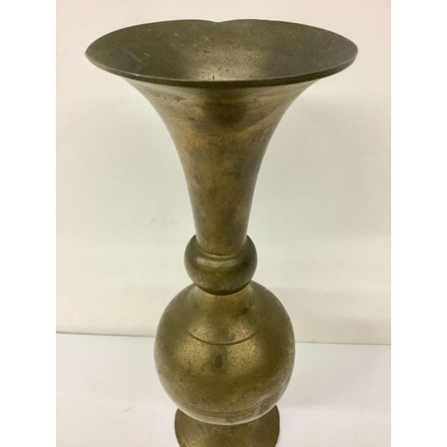 Great statement piece for any decor. This gorgeous brass piece can hold a bouquet of flowers or turned upside down can...