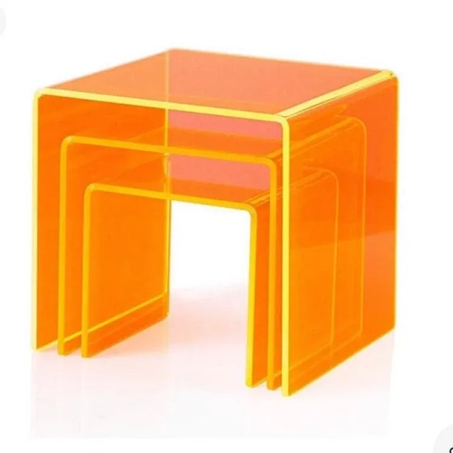 Custom Color Lucite Nesting Tables, Set of 3 Our exclusive Custom Color Nesting Tables are a chic uptake on the standard...