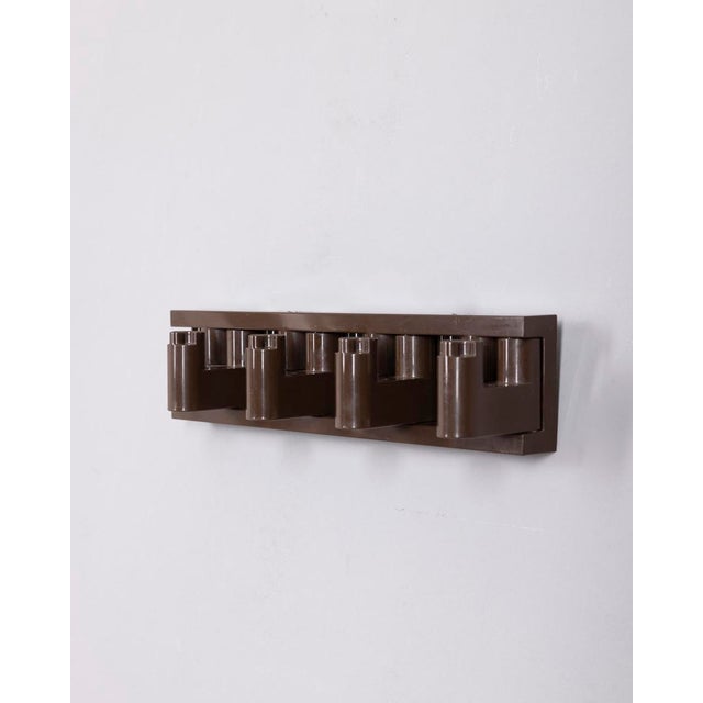 Brown plastic wall coat hanger with four foldable hooks, MiniVip model, designed by Benati and Brunori for Velca, 1970s....