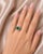 Metal: 18K White Gold Primary Stone: 1 Natural Oval Emerald (0.9 CT, 8 mm x 6 mm) Additional Stones: 2 Natural Pear-Shaped...
