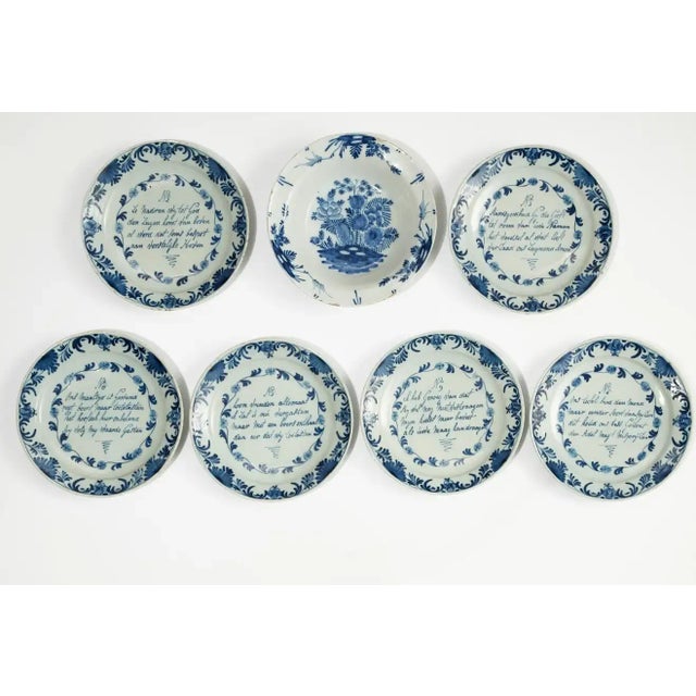 Set of 18th century Delft plate. Six from a series. One bowl of different form.