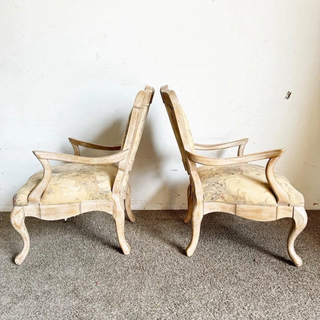 Discover the charm and elegance of the French countryside with this exquisite pair of French Provincial White Washed...