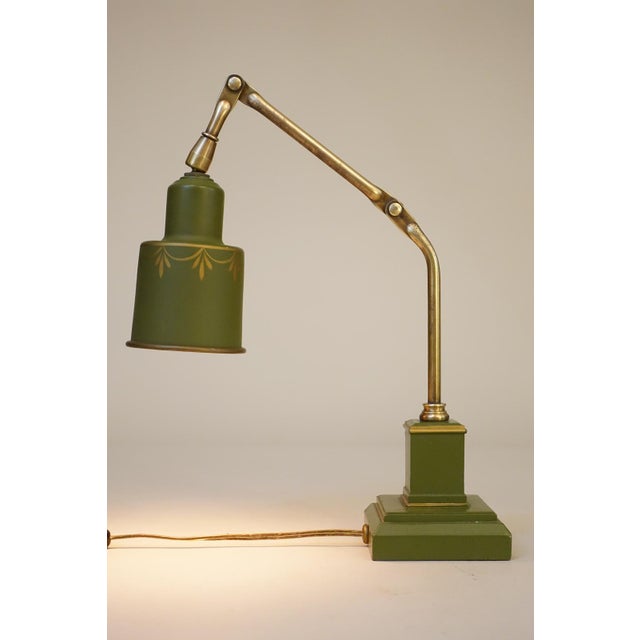 A brilliant and exceptional Industrial Machine Age Brass Empire Regency Toleware double arm articulating table lamp...