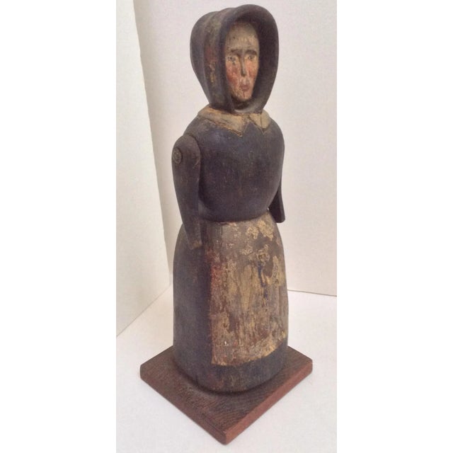 Possibly American and early 19th Century with original painting, this sculpture is truly a treasure. Her carved and...