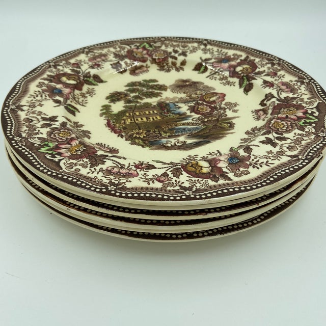 A beautiful set of six vintage English dinner plates in the iconic Tonquin pattern by Clarice Cliff for Royal...