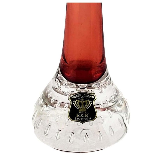 Mid Century vintage art glass vase by Golden Crown E & R Sweden. This sleek modernist piece has a tall slender body...