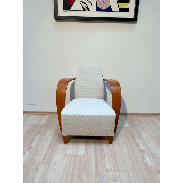 Elegant vintage design armchair, club or lounge chair from Spain, late 1990s Strongly curved, high armrests in beech...