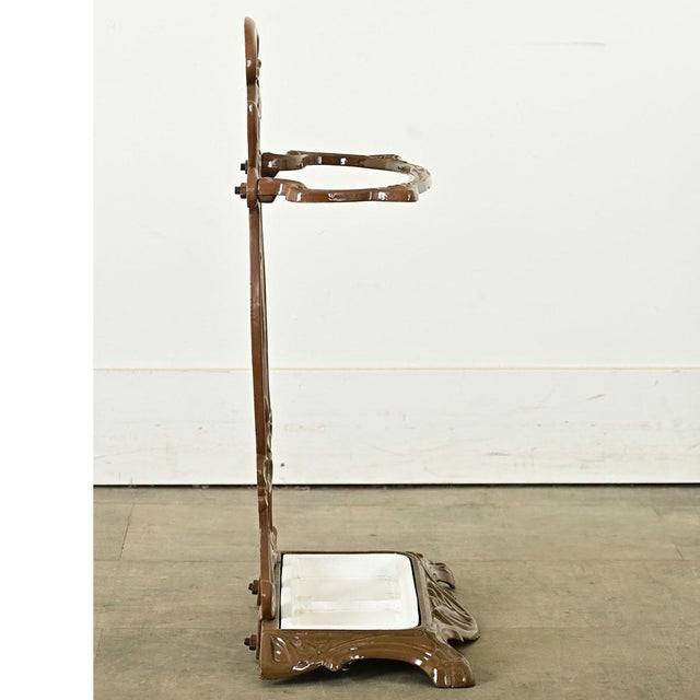 Dimensions: 23 ½” H x 16” W x 7 ⅞” D A sculptural turn of the century (circa 1900) French Art Nouveau umbrella stand,...