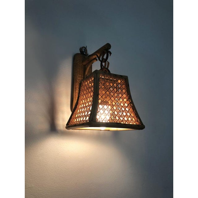 Pair of lantern wall lights in rattan and canework. 50s 60s Very beautiful pair of lantern-shaped wall lights, rattan and...