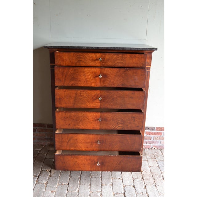 19th-century Dutch mahogany chest of drawers, chiffonier, sideboard. The height is 129 cm. The width is 99 cm. The depth...