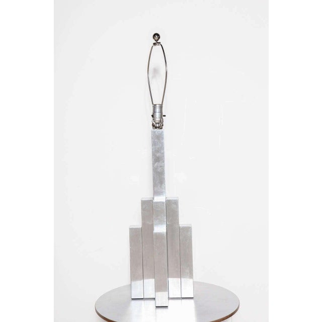 Large Modern Habitat International Reflective Architectural Aluminum Tower Table Lamp, 1960's. Featuring an illuminating...