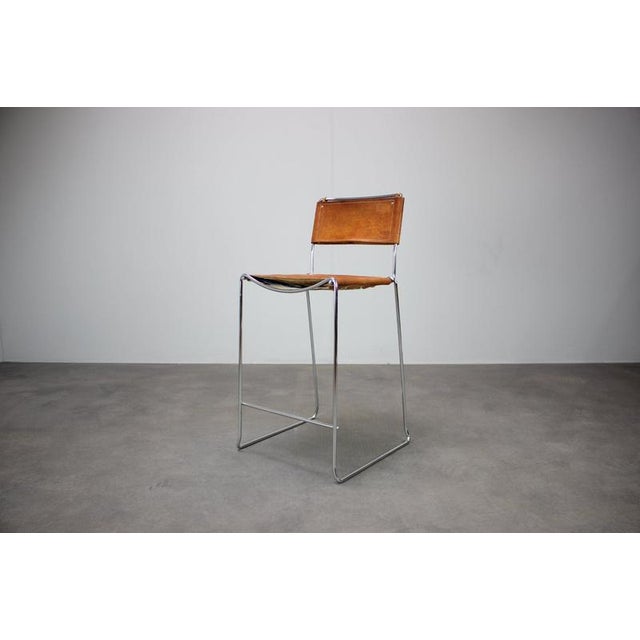 A distinctive vintage Italian bar stool designed by Giandomenico Belotti for Alias, dating from the late 1970s. The piece...