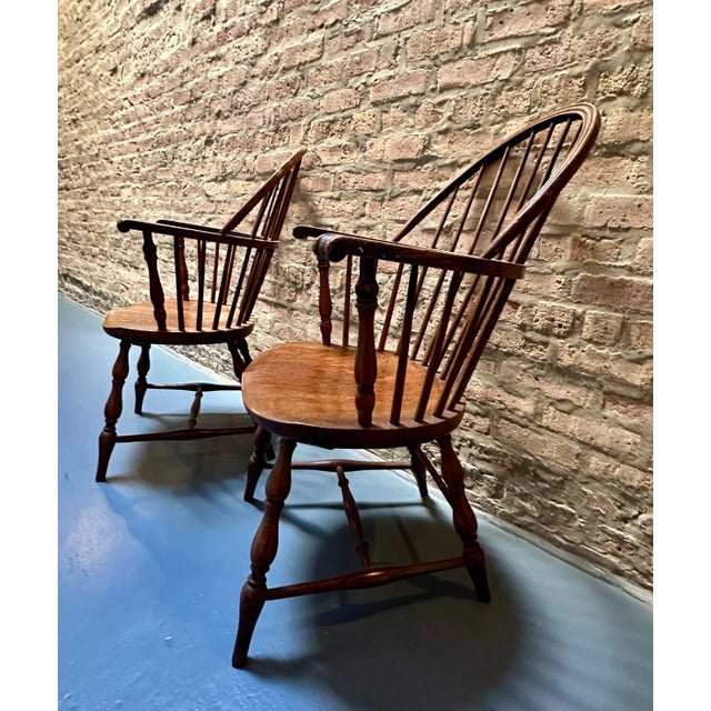 Pair of very comfy bow back oak armchairs in good condition, each labeled : KARPEN , Chicago IL. Circa 1920.