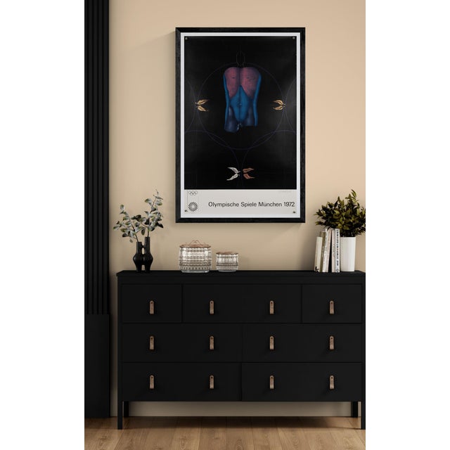The Piece This original vintage poster was created for the 1972 Munich Olympic Games, featuring the distinctive artistic...