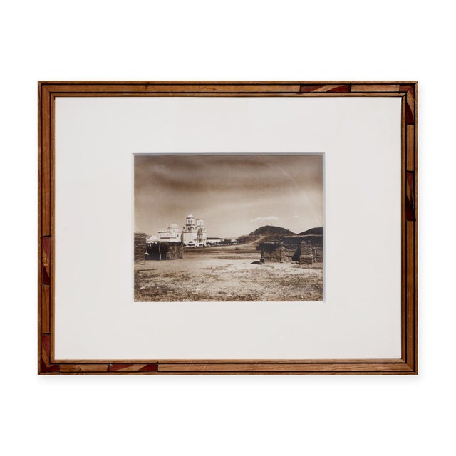 Sepia-toned architectural photograph of San Zavier Mission, a historic Spanish Catholic mission located near Tucson,...