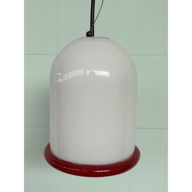 This elegant chandelier, made by ITRE (the label still remains on the glass) in the 1960s and 1970s, features a dome-...