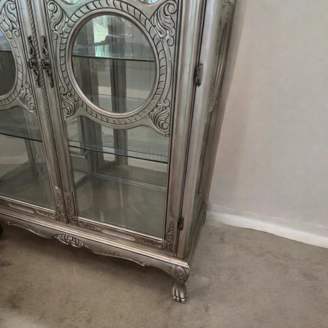 Italian Neoclassical Gray Glass Display Cabinet / Curio Vitrine An elegant Italian-inspired statement cabinet featuring...
