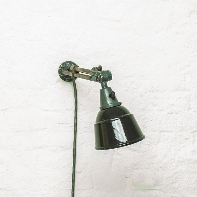 Midgard Wall Lamp by Curt Fischer for Industriewerke Auma, in Good conditions. Designed 1920 to 1949 This piece has an...