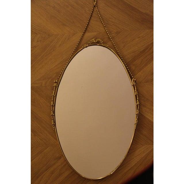 1950s Oval Brass Wall Mirror with Neoclassical Decoration and Brass Chain, 1950s For Sale - Image 5 of 17