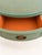 Description: A charming 1940s pedestal table with a circular top, discreet drawer, and sculptural pedestal base with...