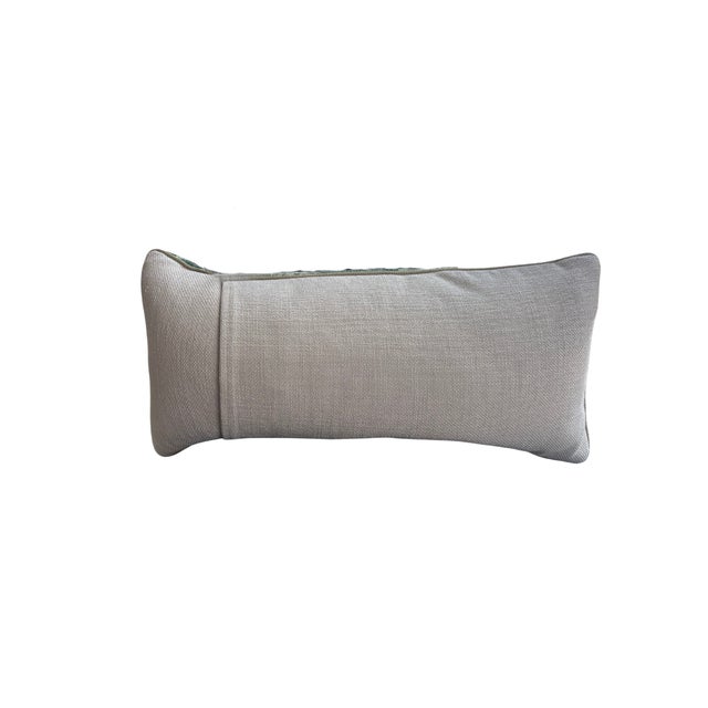 This beautiful lumbar pillow by Scalamandre is a high-end, luxury accent pillow featuring an all-over foliage design...