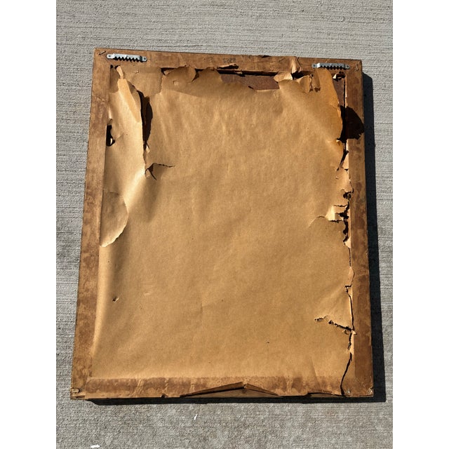 Gorgeous antique oval mirror inside a gilt frame with decorative French style ornamental corners. Please look closely at...