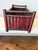 Likely dating to the 1950s, this vintage bamboo planter box features closely spaced bamboo panels and a rich, dark...