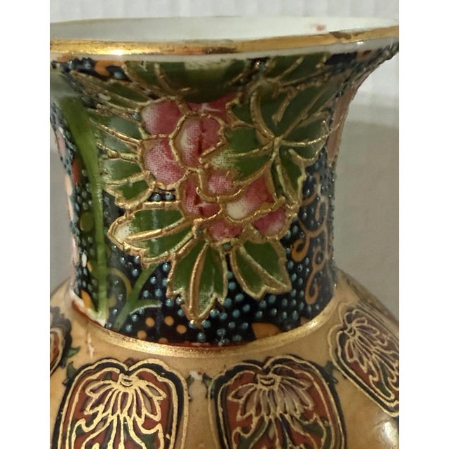 This Vintage Chinese Satsuma Moriage Vase features intricate hand painted cranes and floral designs in gold gilt,...