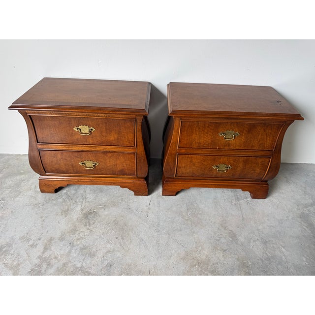 Elevate your bedroom with this classic pair of Ray O’Donnell Interiors nightstands, featuring a graceful bombe silhouette...