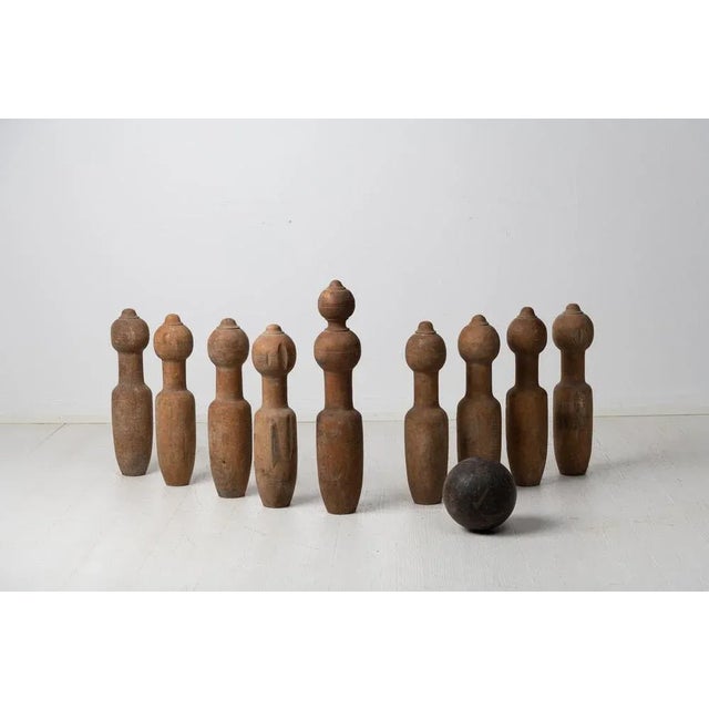 Swedish antique bowling set from the mid 19th century, around 1850. The set, a skittles or ninepins game as it’s also...
