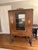 Beautiful antique Colonial Revival display cabinet dating to the early 20th century. This elegant piece features a...