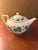The product is a rare vintage Wedgwood Napoleon Ivy teapot in green Queen's Ware bone china, made in England in 1815. This...