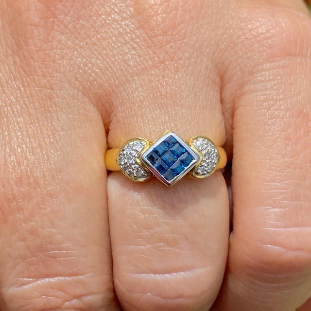 Gorgeous square cut sapphire and round cut diamond cocktail ring for women. This ring is cleverly molded with a mirrored...