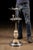 Chrome-plated smoking stand combining aviation-themed design with multiple smoking accessories and integrated lighting....