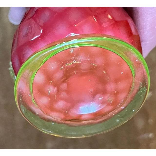 Antique late 19th century American cased glass small vase. White interior covered with bright pink . Overall relief molded...