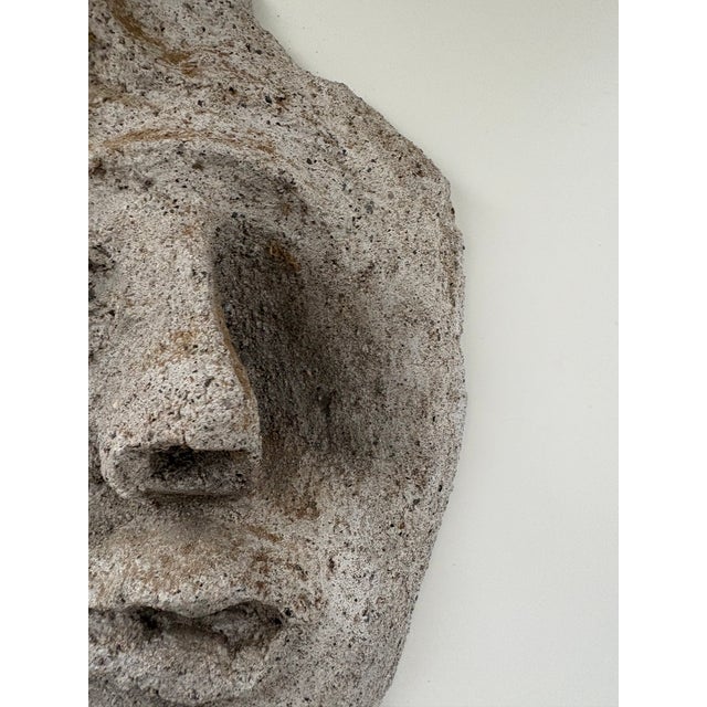 A sculpture after Picasso with his recognizable features.