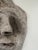 A sculpture after Picasso with his recognizable features.