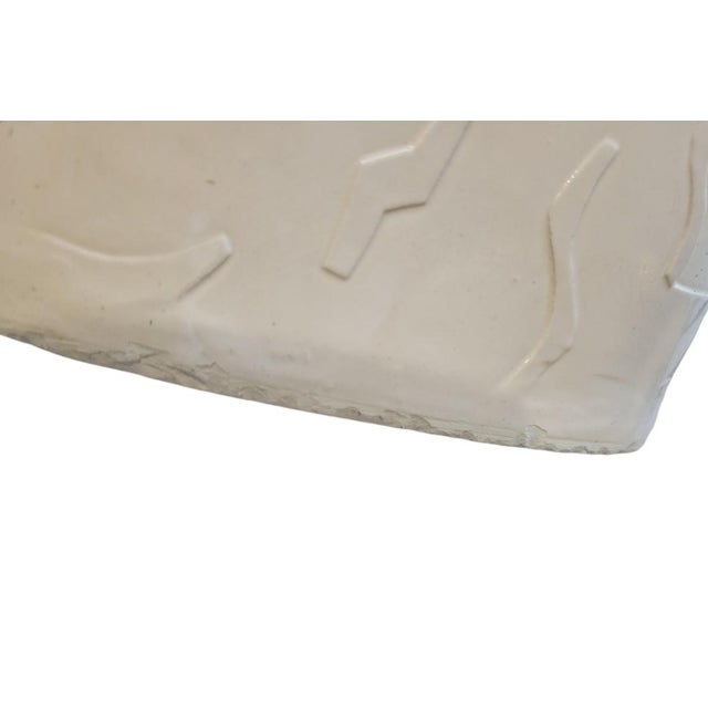 A unique Vintage Demery Aztec piece of pottery from 1988. The piece of art features a folded bag design in very soft...