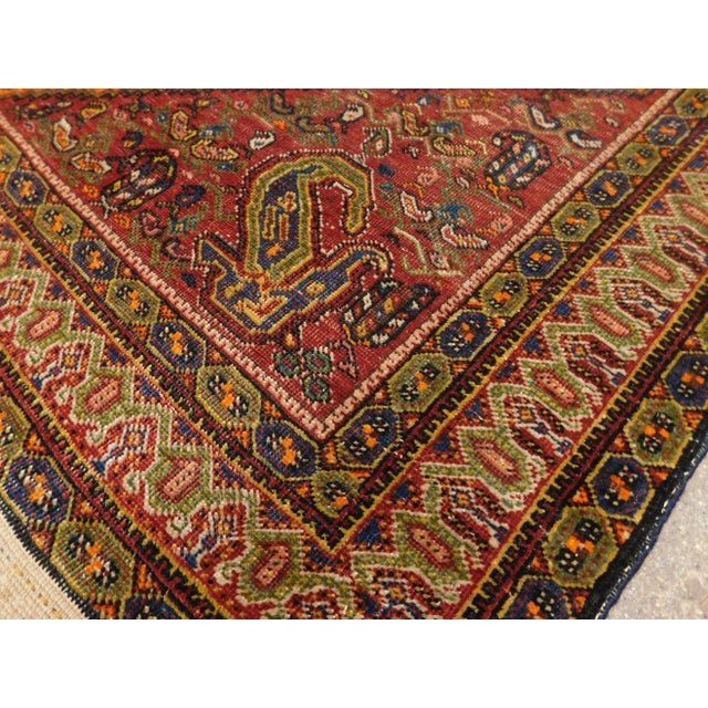 Origin: Persian Circa: 1900 Material: wool pile: Foundation: Cotton Hand knotted 4'2"x 6'10"