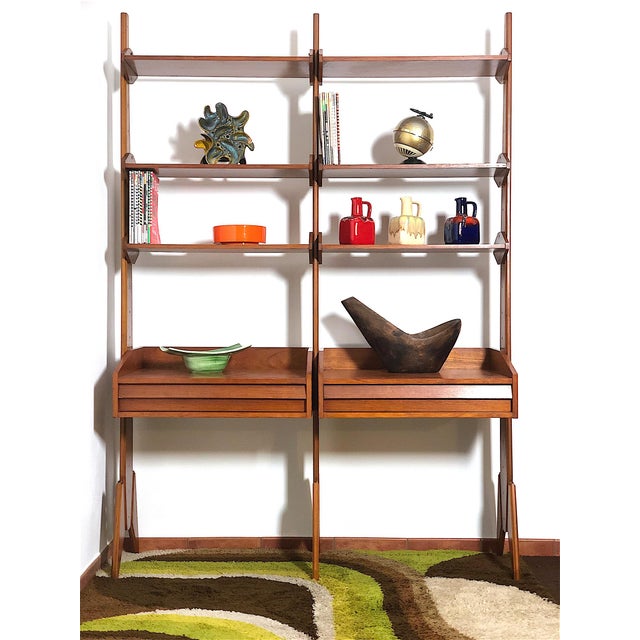 Double-sided modular bookcase with two bays, from the 1960s. The bookcase is made in Italy, completely restored and...