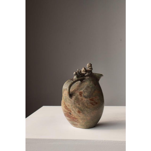 A rare and sculptural stoneware jug from bode willumsen's own workshop, dating to the 1930s. The organically modeled form...