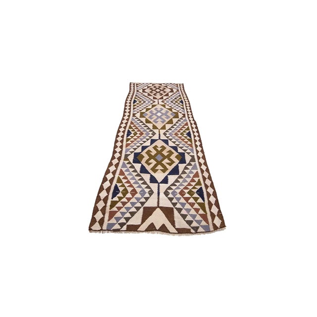 Vintage handwoven decorative kilim runner from Northern Iraq. Approximately 40-50 years old. In very good condition.