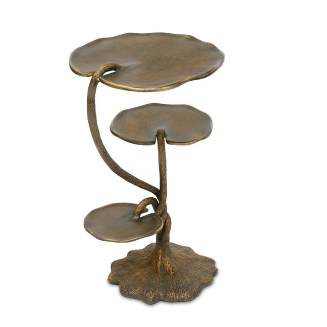 From her cozy screened porch, Bunny has the perfect view of water lily pads gently floating on her koi pond. It got us...