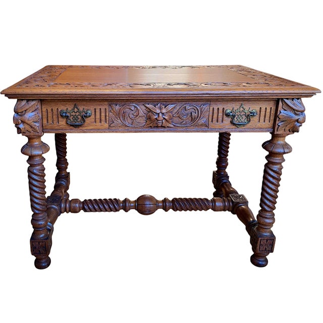 On offer is an antique American Renaissance Revival library or writing table, typically dated to the 1890s. Hand-crafted...