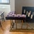 Brass gold fireplace fender with purple velvet cushion seating. Slide stain on right side of velvet cushion (see photos)