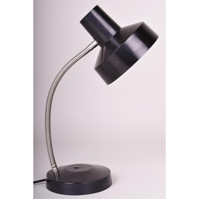 This retro table lamp dates back to the 1970s and stands as an excellent example of the applied design of that era. It is...