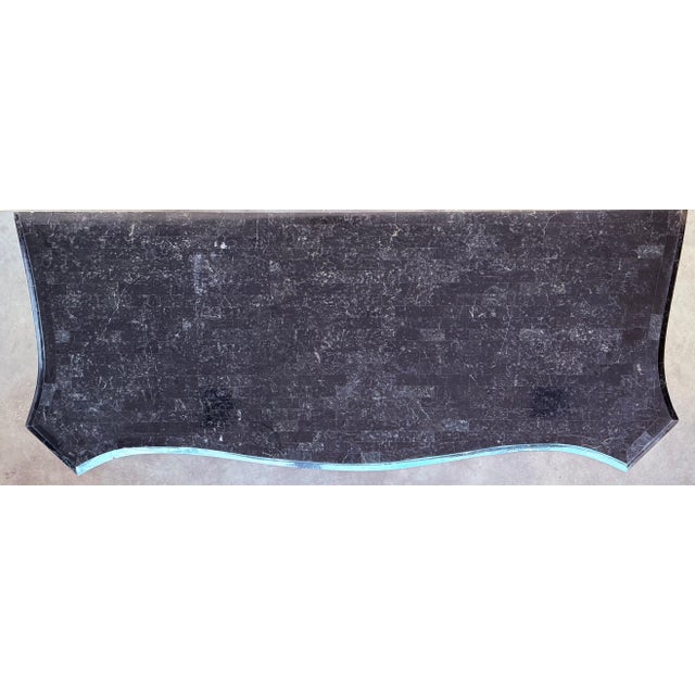 A stunning French 19th century Louis XV st. wrought iron, gilt metal and Green marble console. The wall mounted console is...