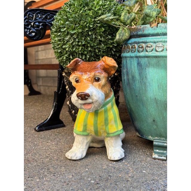 Certain to bring a smile to your face, here is a terra cotta type hand painted and glazed Boston Terrier wearing a preppy...